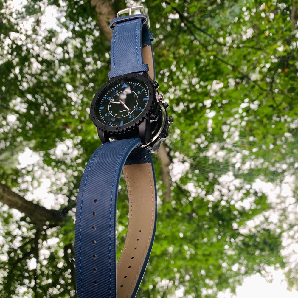 Black and blue chunky watch with leather straps
